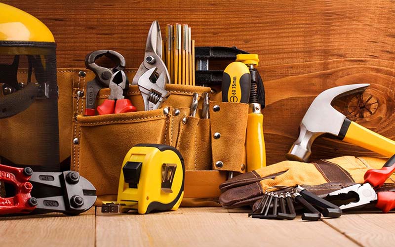 Set of working tools on wooden boards Home Maintenance Inspection Services